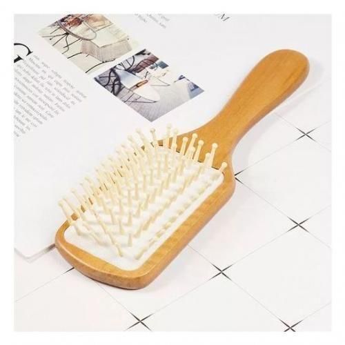 Peigne en bois pour le soin des cheveux